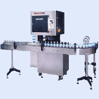 Shrink label and cap applicators